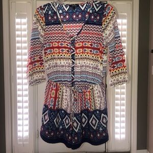 Size small women’s patterned button up romper
